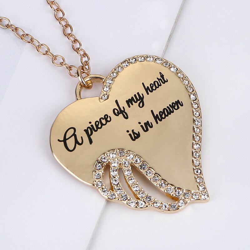 Angel wing heart necklace