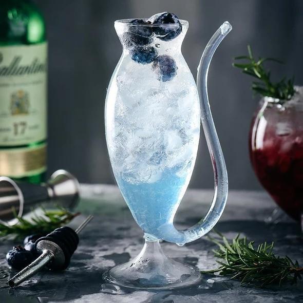 Glass cup with straw