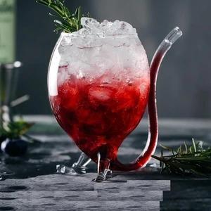 Glass cup with straw