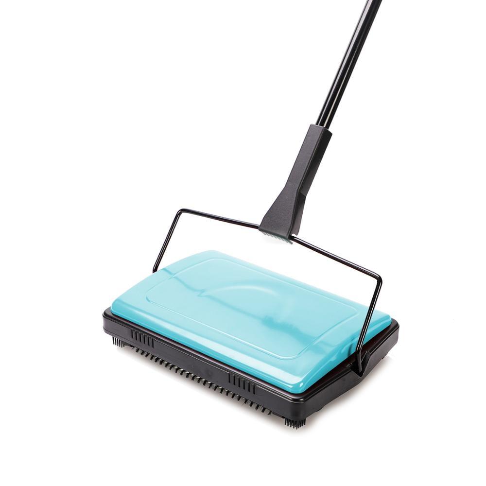 Manual carpet and floor sweeper