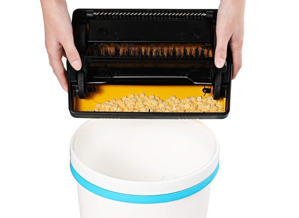 Manual carpet and floor sweeper