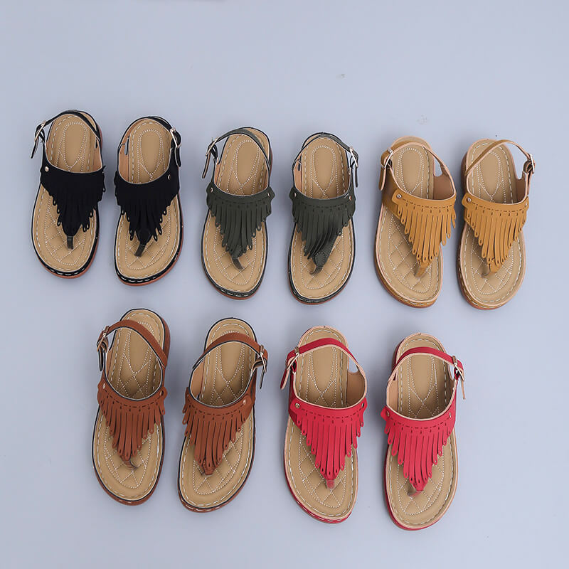 Sandaler med stranddusk