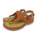 Sandaler med stranddusk