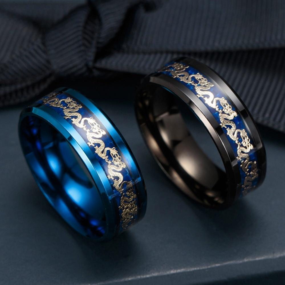 Ringer i titanlegering med drage-motiv