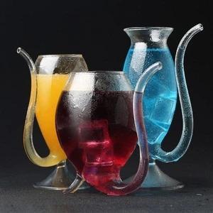 Glass cup with straw