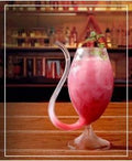Glass cup with straw