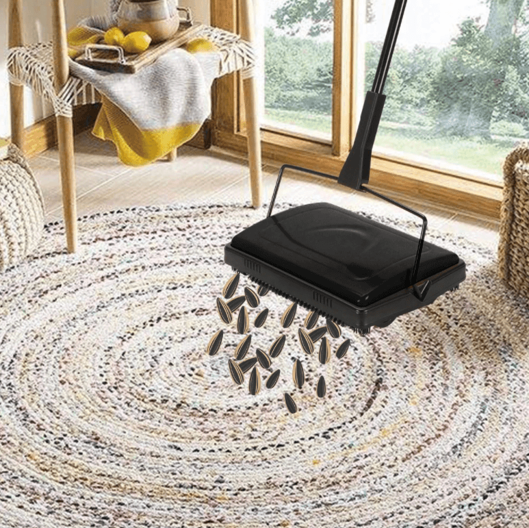 Manual carpet and floor sweeper